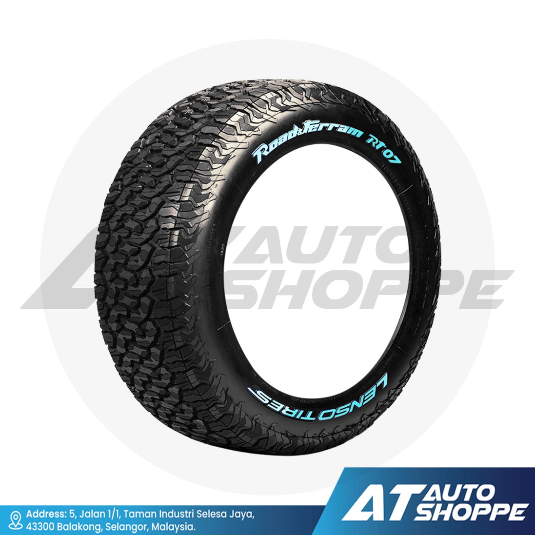 Tire with tread pattern and branding on a white background, featuring AT Auto Shoppe logo.