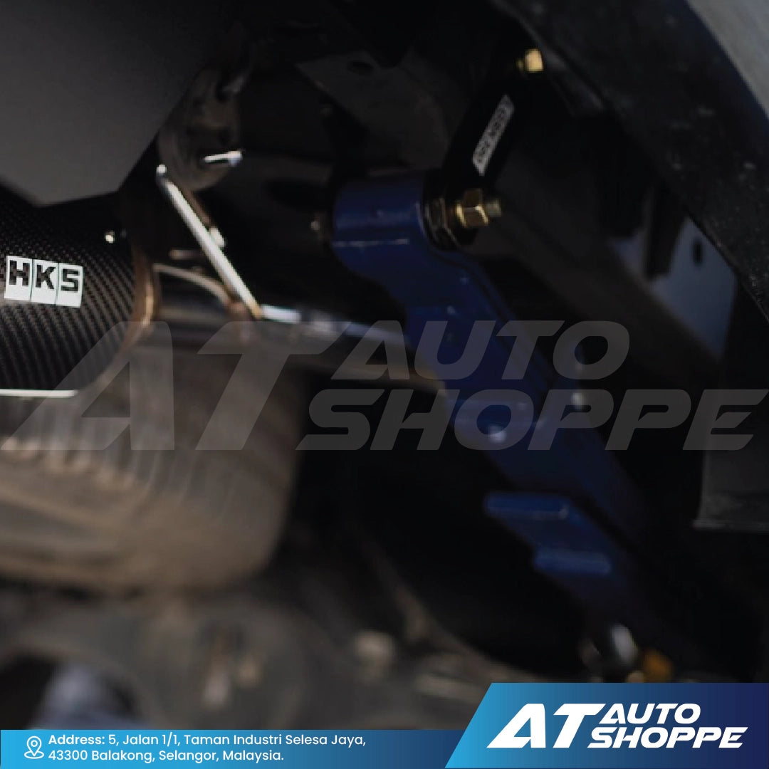 Close-up of car suspension components with a blurred background