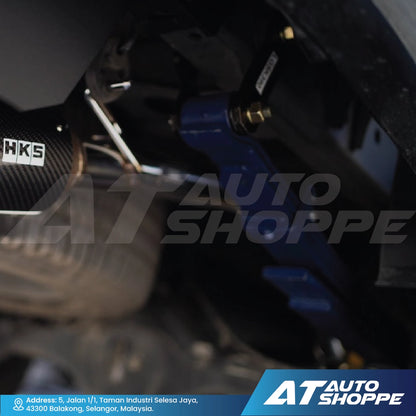 Close-up of car suspension components with a blurred background