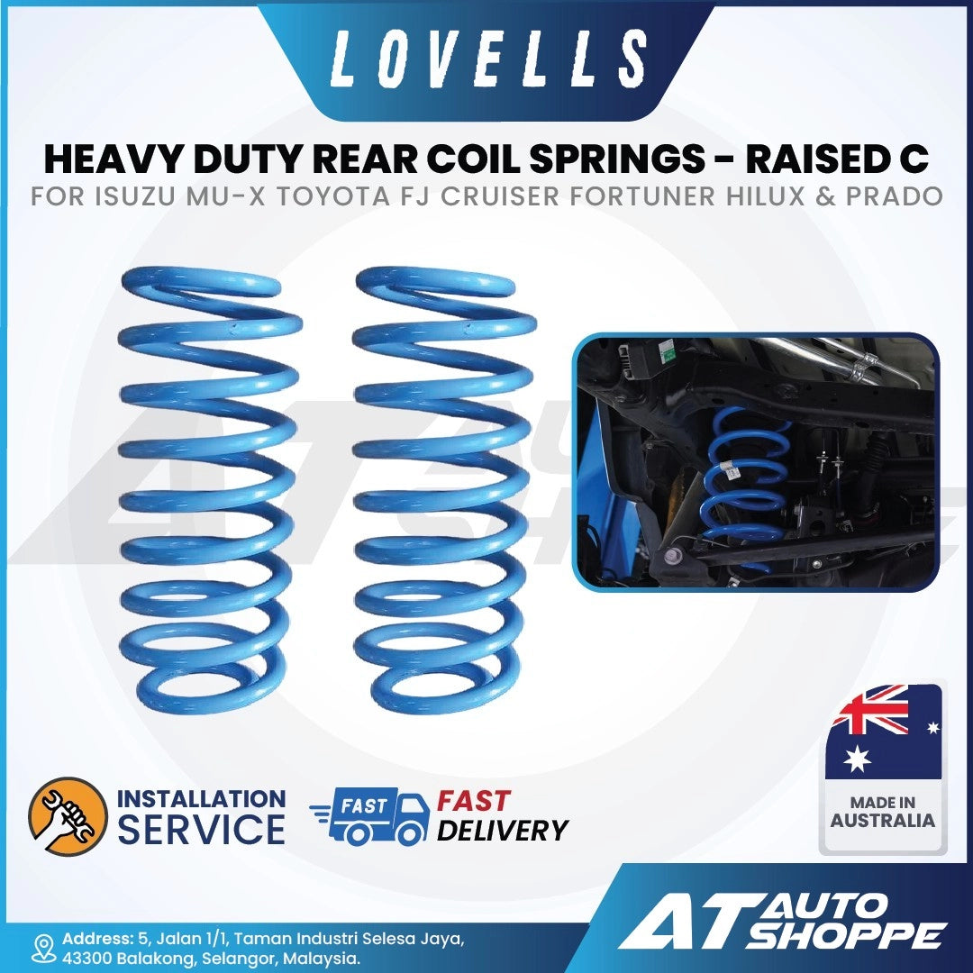 Heavy-duty rear coil springs with Lovells branding on a promotional background