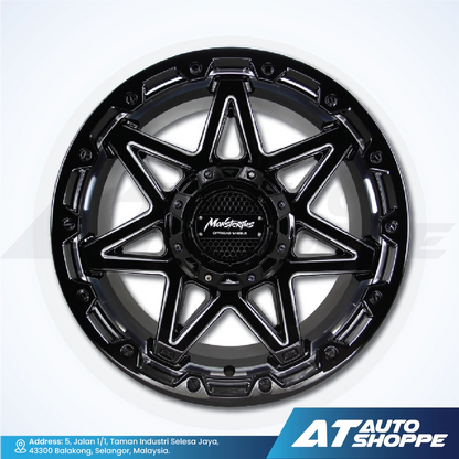 Black star-patterned wheel rim on a white background with AT Auto Shoppe branding.