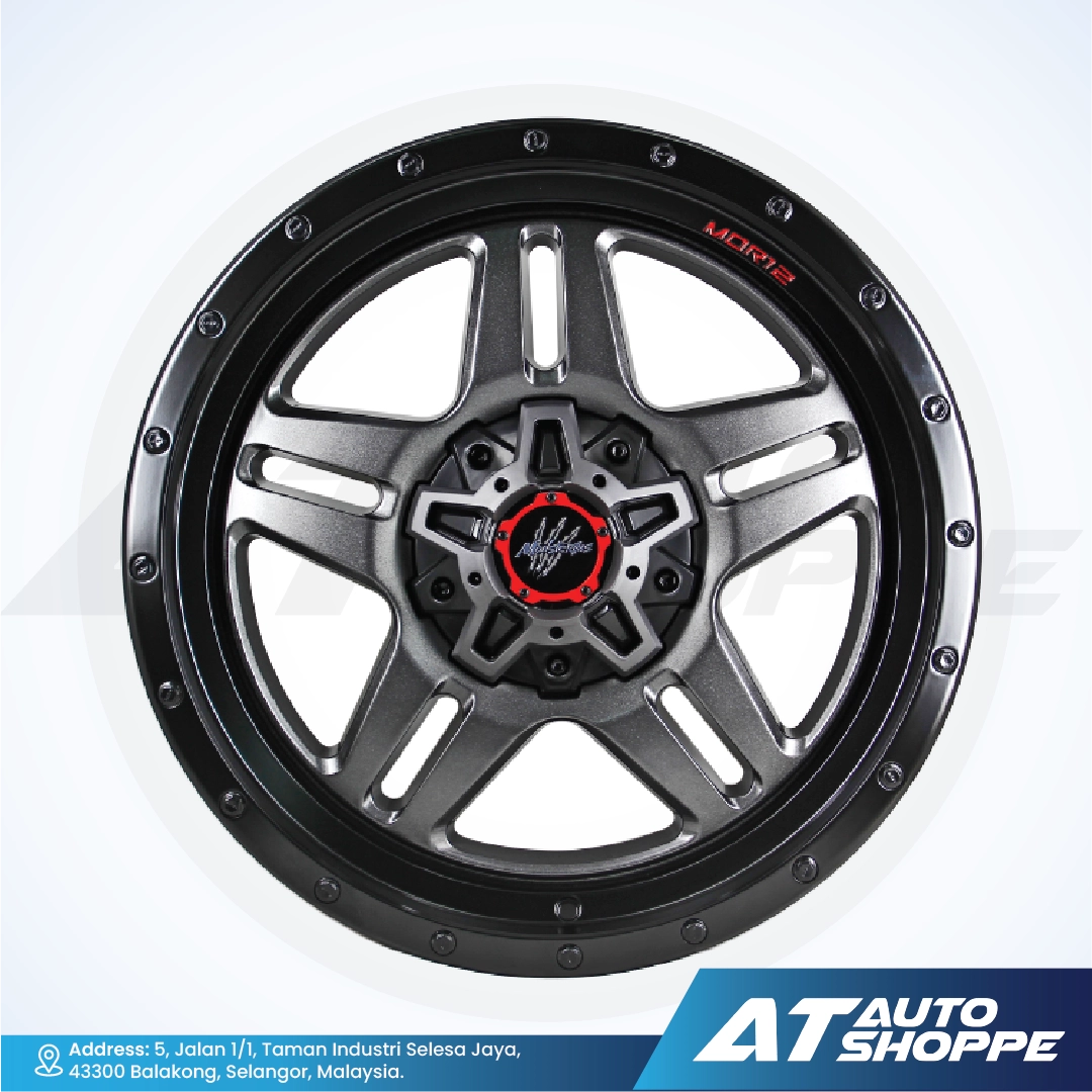 Monsterims wheel with black and red design on a white background, featuring AT Auto Shoppe branding.