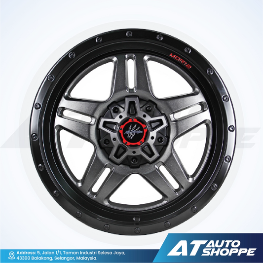 Monsterims wheel with black and red design on a white background, featuring AT Auto Shoppe branding.
