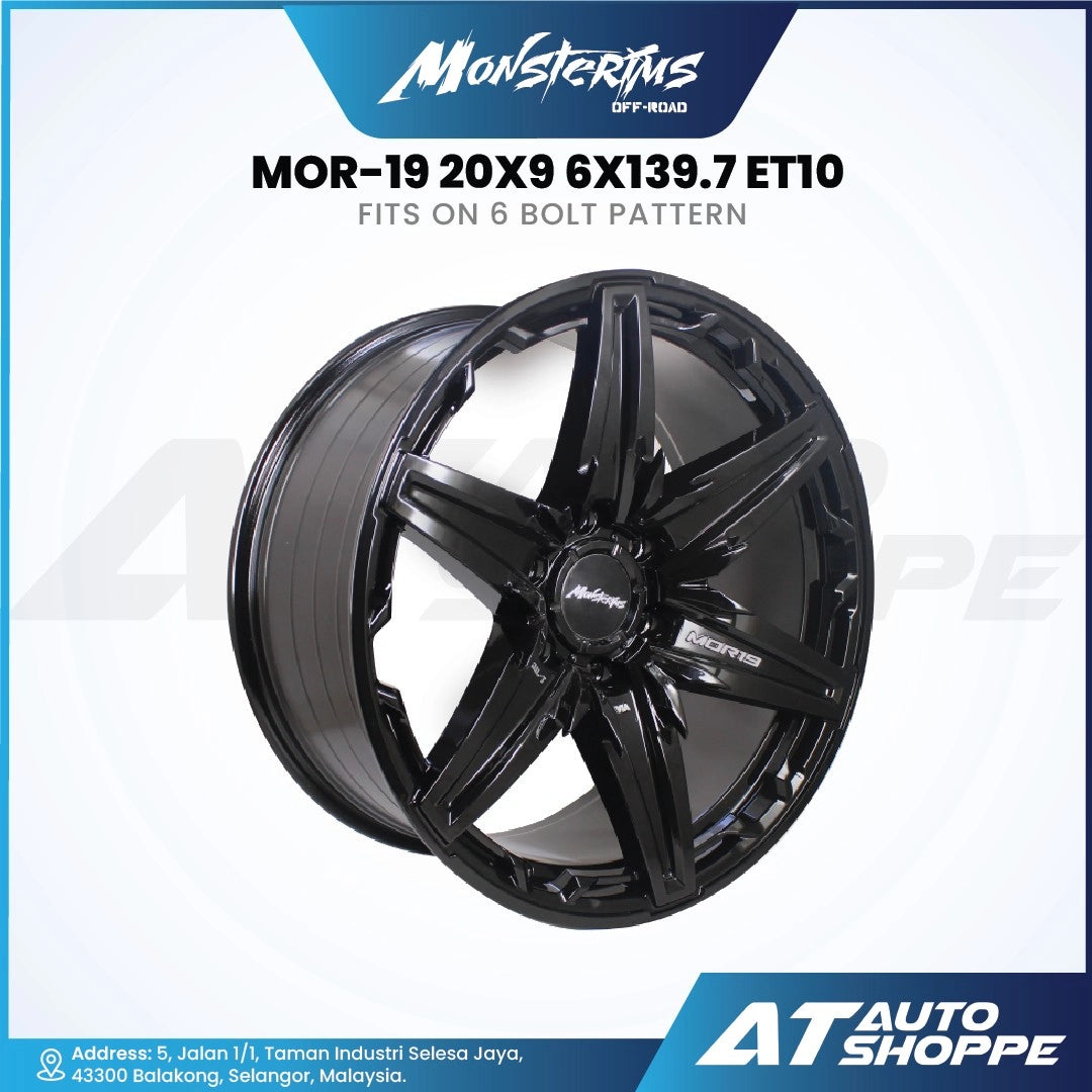 Monsterims wheel with specifications on a white background, featuring AT Auto Shoppe branding.