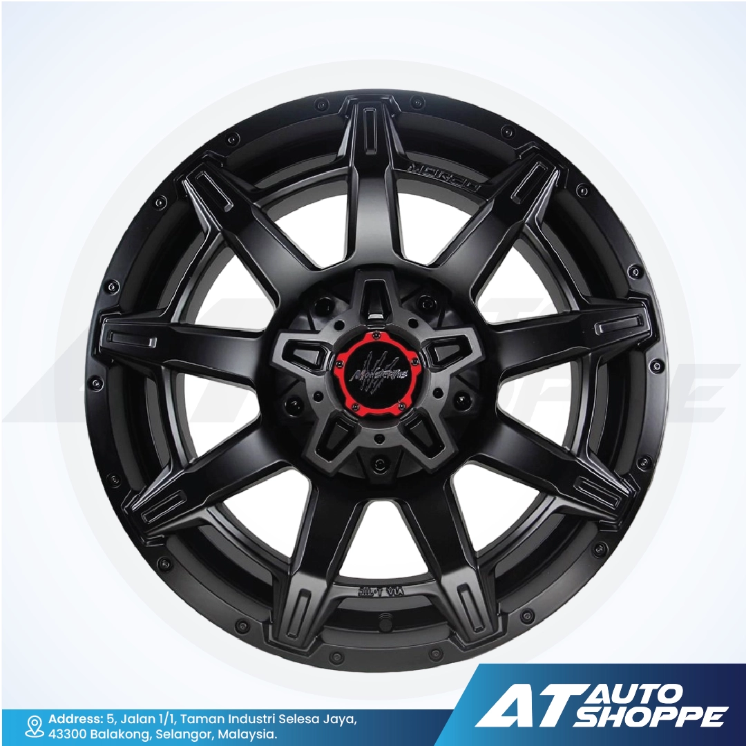 Monsterimswheel with red center on a white background, featuring AT Auto Shoppe branding.
