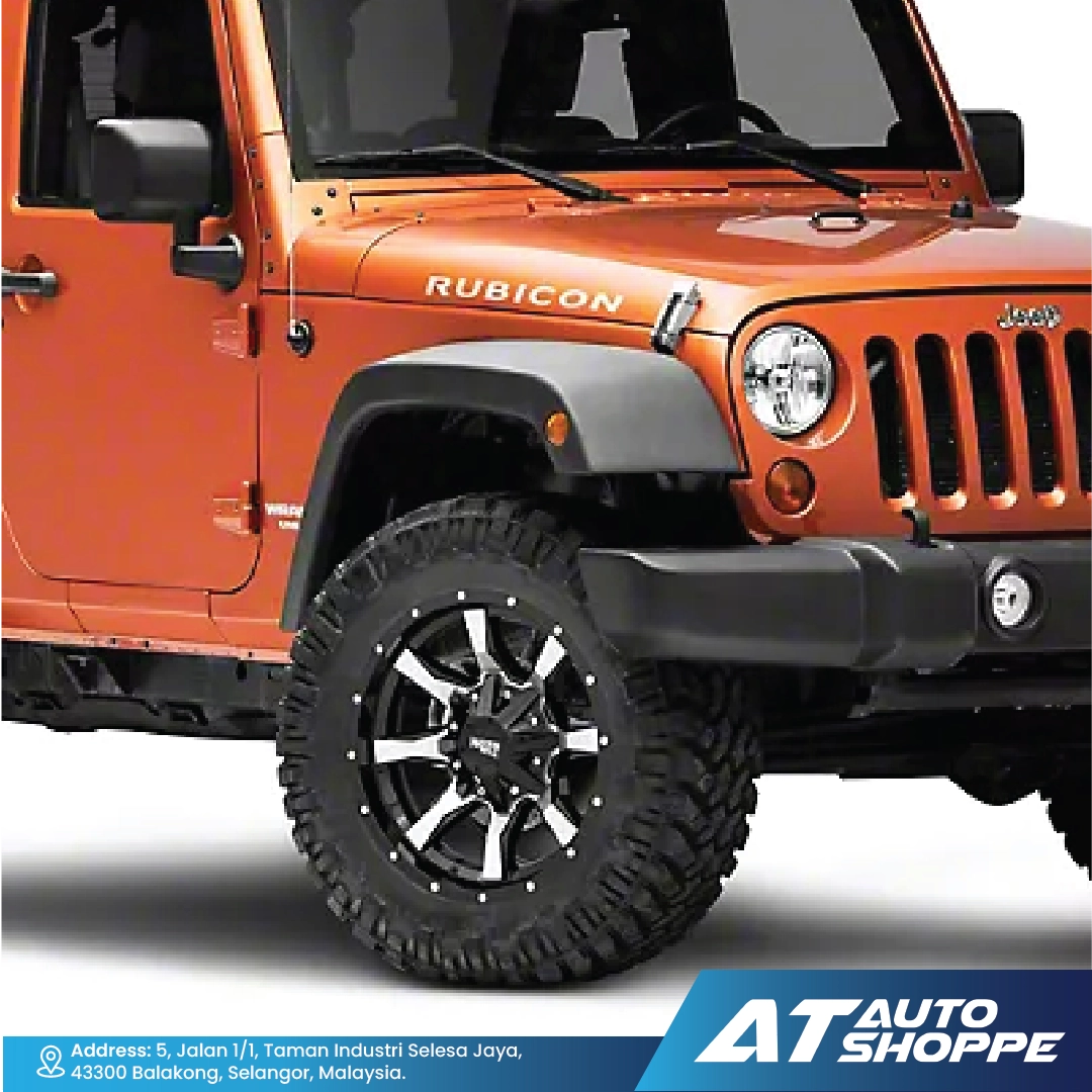 Orange Jeep Rubicon with black wheels on a white background, featuring AT Auto Shoppe branding.