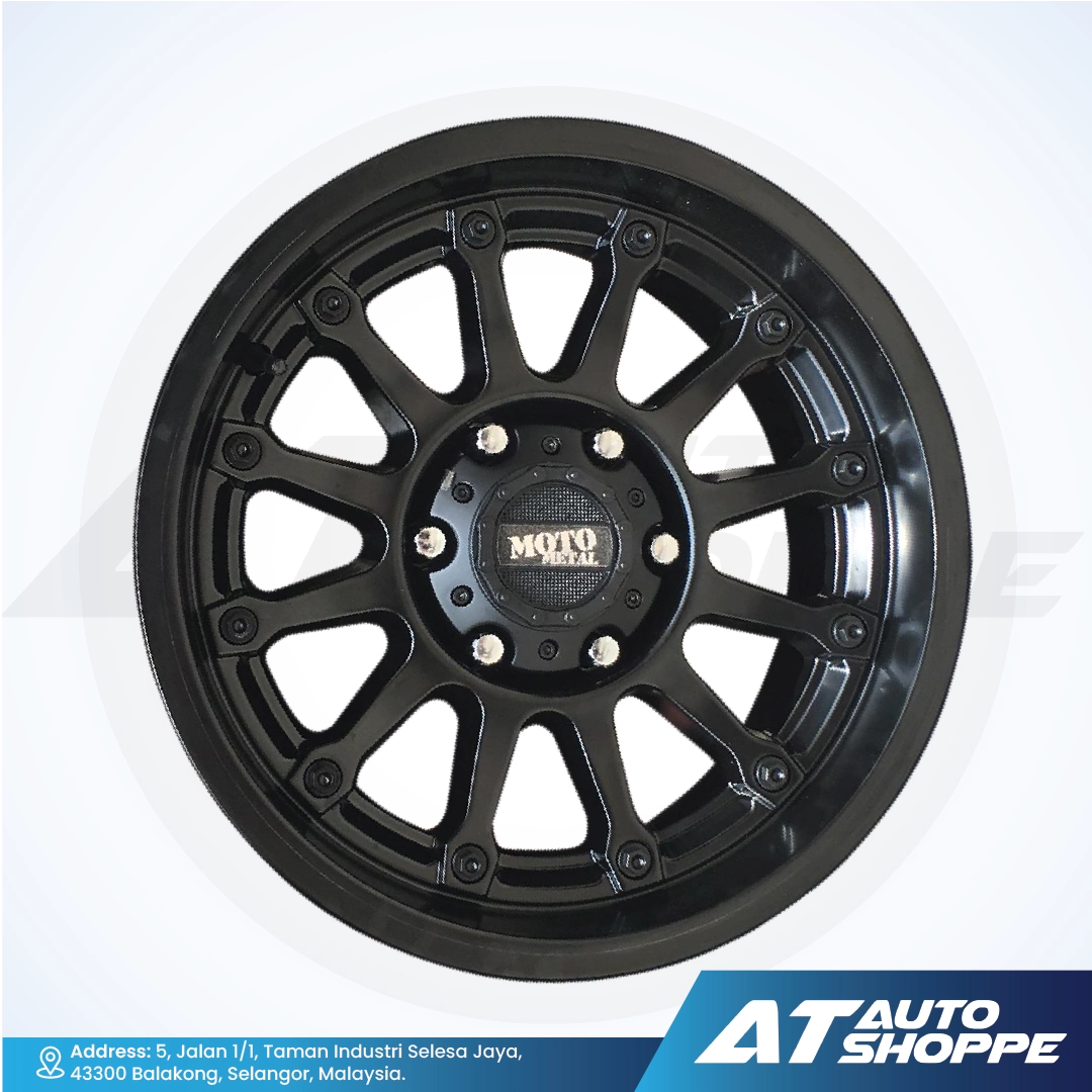 Black alloy wheel with 'Moto Metal' logo on a white background, featuring AT Auto Shoppe branding.