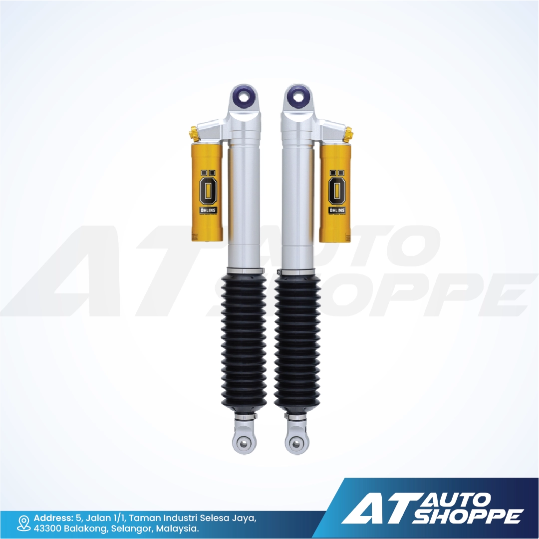Two Ohlins shock absorbers with yellow and black components on a white background, featuring AT Auto Shoppe branding.
