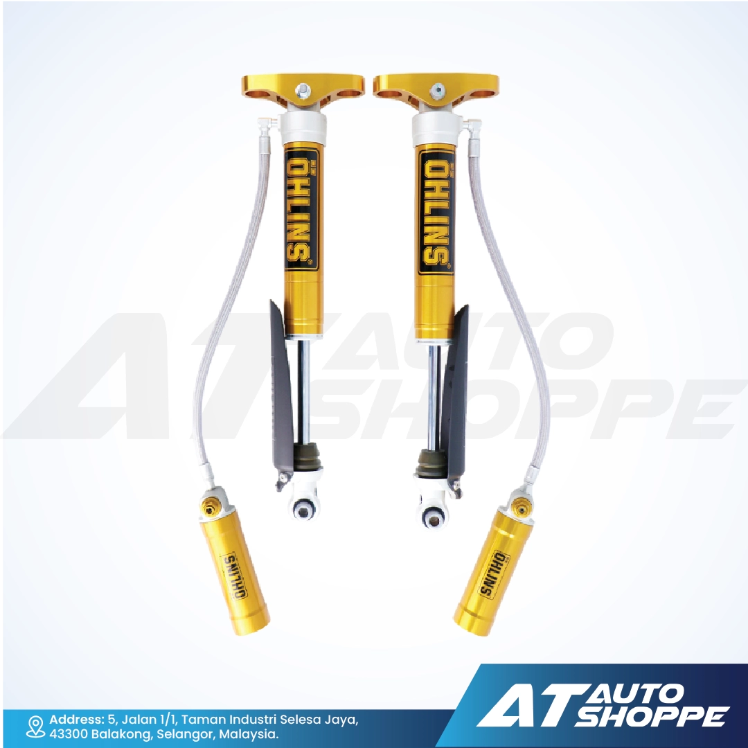 Ohlins shock absorbers with gold and black design on a white background, featuring the brand.