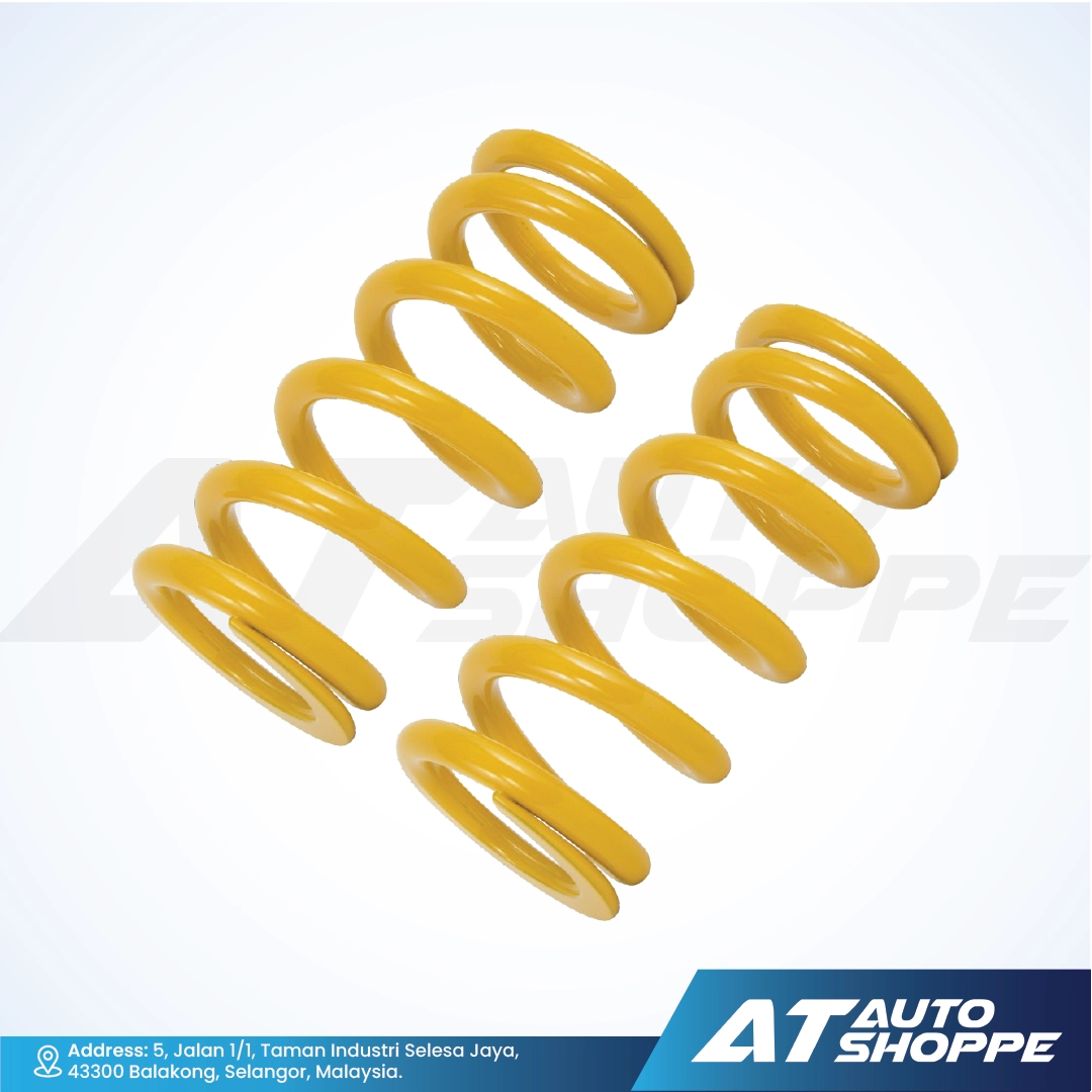Set of Ohlins yellow springs on a white background with AT Auto Shoppe branding.