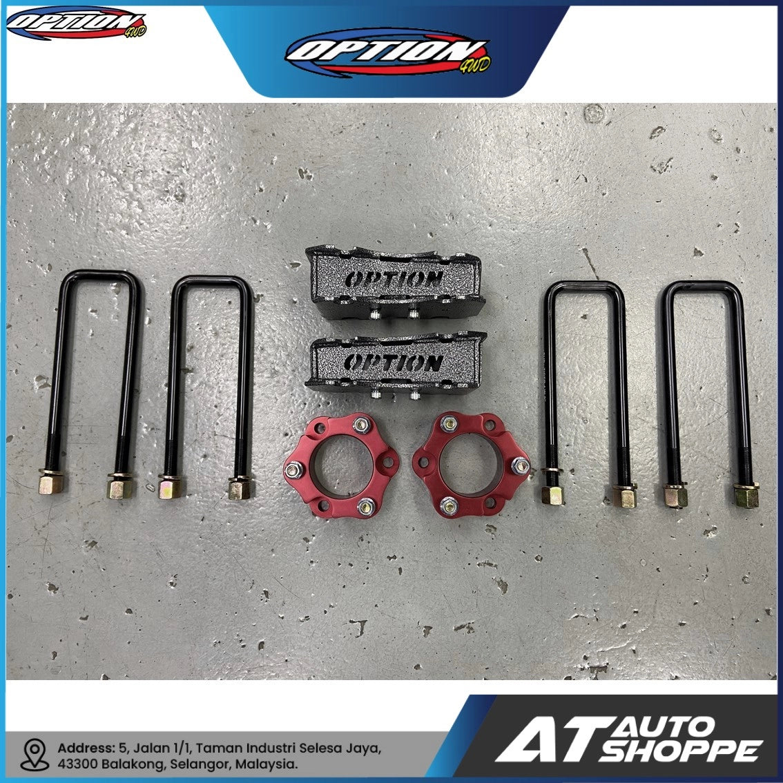 Automotive parts including black U-bolts and red metal components on a gray background with Option and AT Auto Shoppe branding.