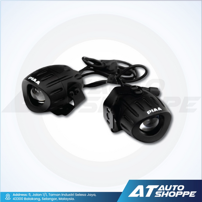 Two black PIAA motorcycle lights on a white background with AT Auto Shoppe branding.