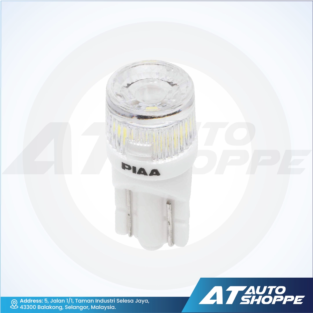 Car bulb with PIAA branding on a white background, featuring AT Auto Shoppe logo.