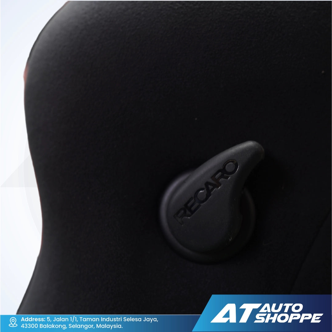 Black car seat with RECARO logo on a white background, featuring AT Auto Shoppe branding.