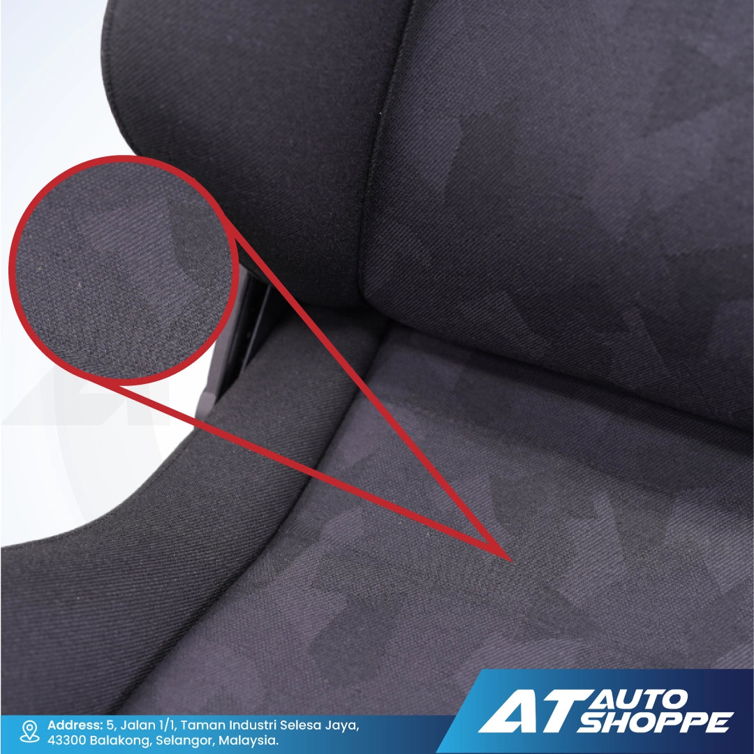 Close-up of a Recaro car seat with a textured pattern and AT Auto Shoppe branding.
