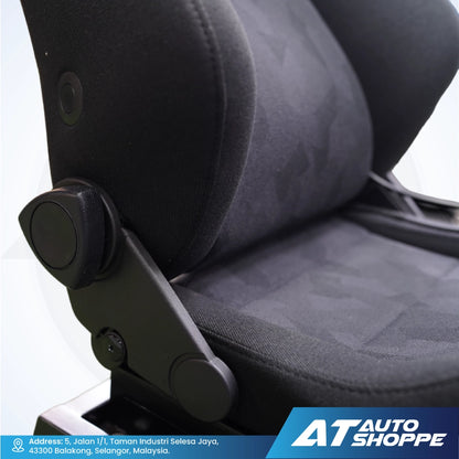 Close-up of a Recaro car seat with a black adjustment lever, featuring the AT Auto Shoppe logo.