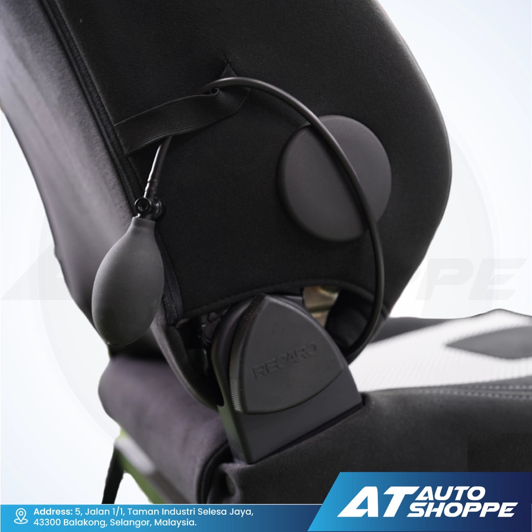 Recaro car seat safety harness on a black car seat with AT Auto Shoppe branding.