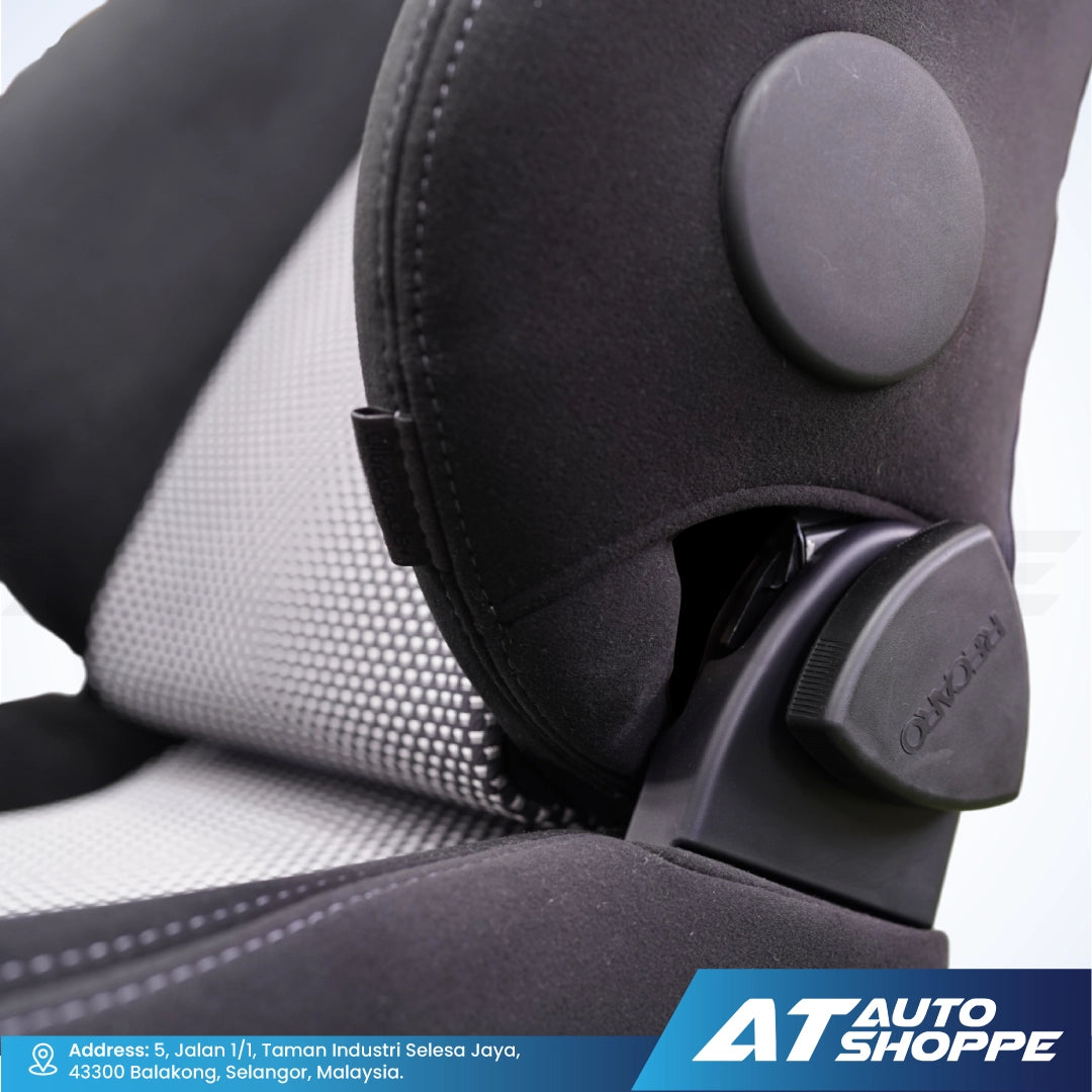 Close-up of a Recaro car seat with a visible brand logo on a white background