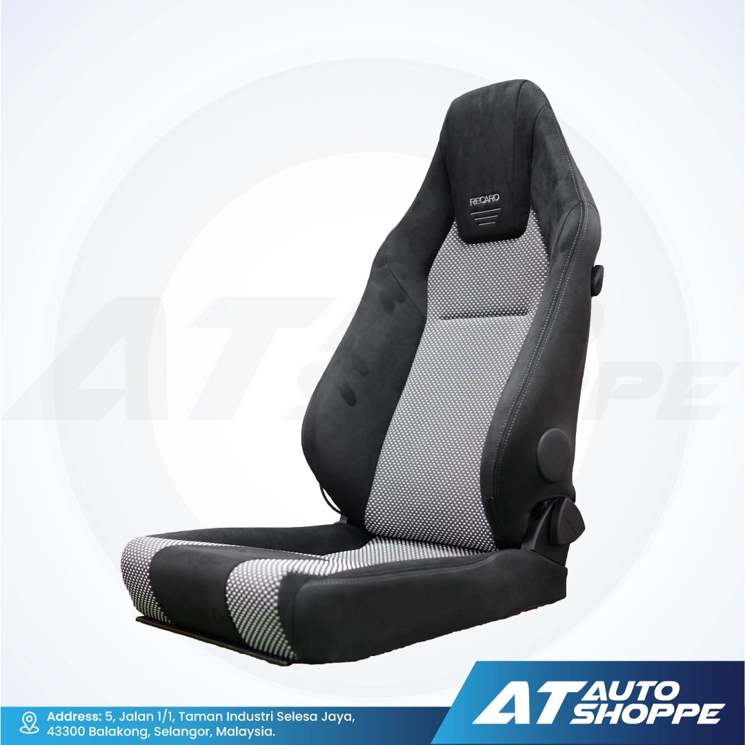 Black and gray Recaro car seat with 'AT Auto Shoppe' branding on a white background