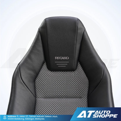 Black car seat with Recaro branding on a white background, featuring AT Auto Shoppe logo.