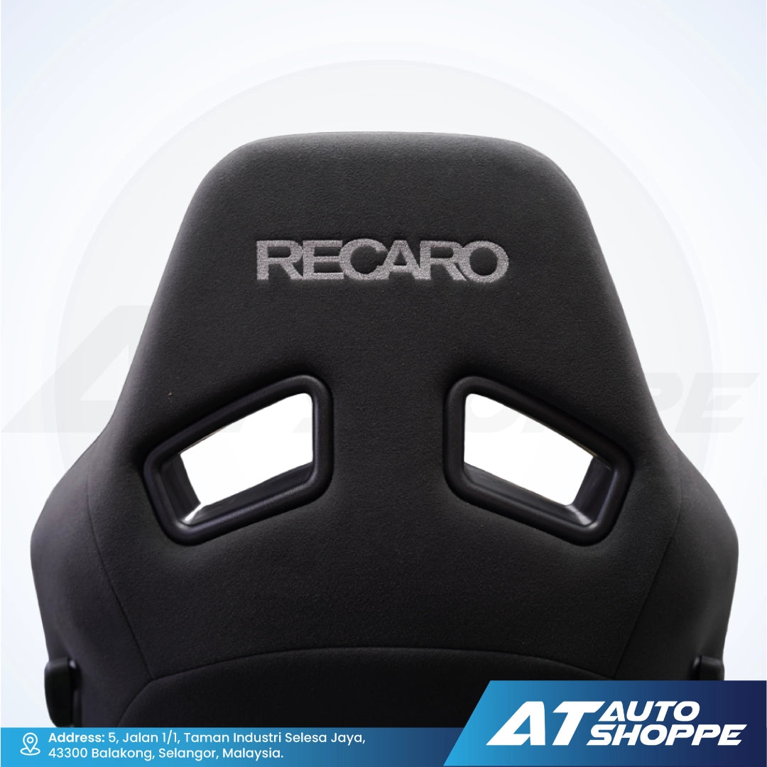 Black car seat with Recaro branding on a white background.