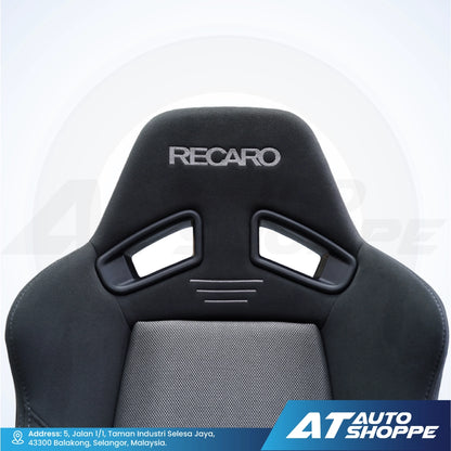 Black and gray Recaro car seat with visible branding on a white background