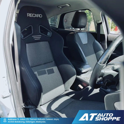 Car interior with Recaro seats and AT Auto Shoppe branding.