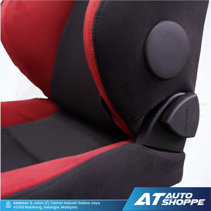 Close-up of a Recaro black & red car seat.