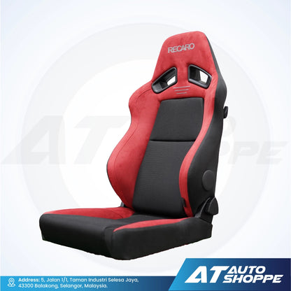 Red and black car seat with Recaro branding on a white background, featuring AT Auto Shoppe logo.