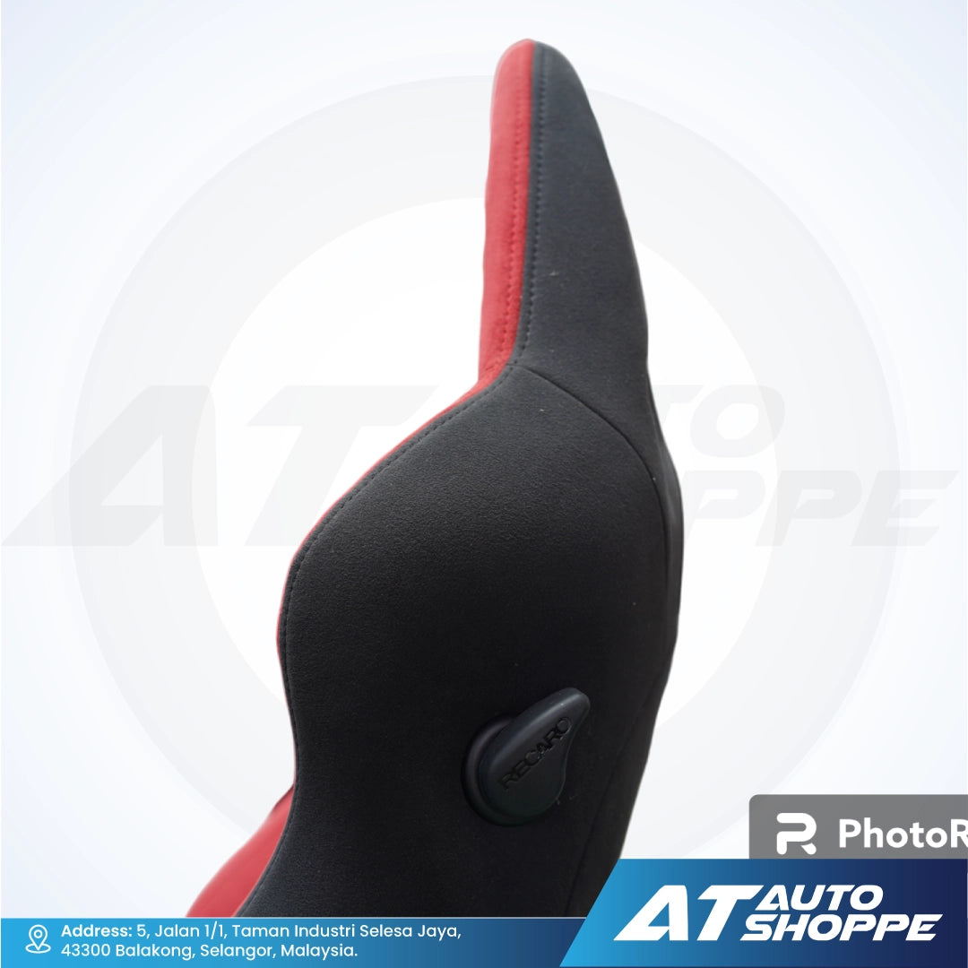 Recaro black and red car seat with a white background.