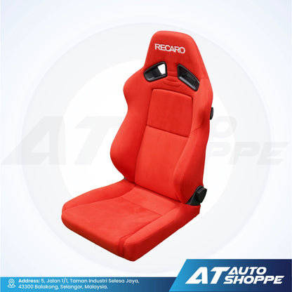 Red car seat with Recaro branding on a white background, featuring AT Auto Shoppe logo.