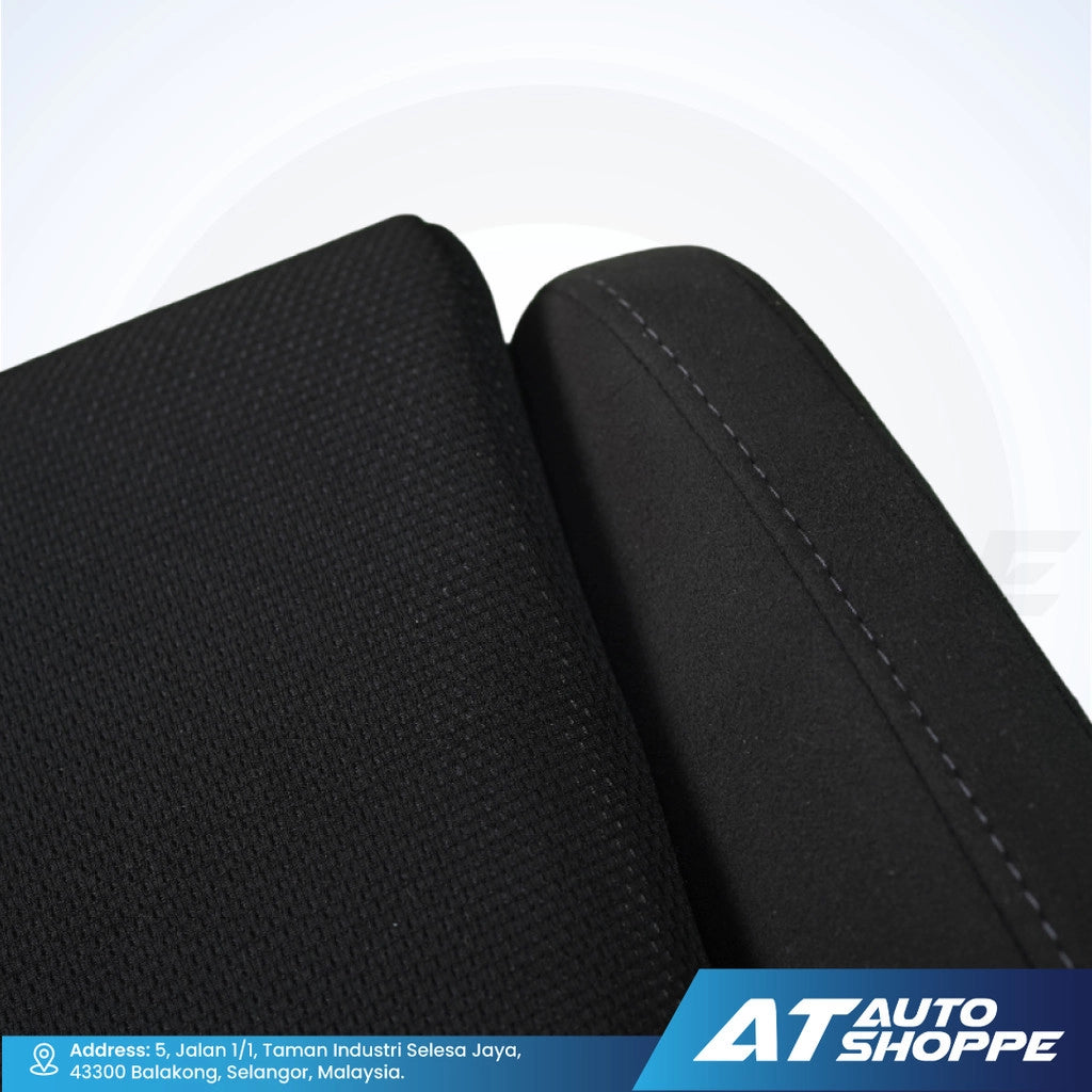 Close-up of black car seat cover with stitching detail on a white background, featuring AT Auto Shoppe logo.
