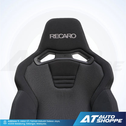 Black Recaro car seat on a white background with AT Auto Shoppe branding.