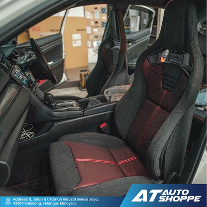 Recaro car interior with black and red seats, showing the AT Auto Shoppe branding.