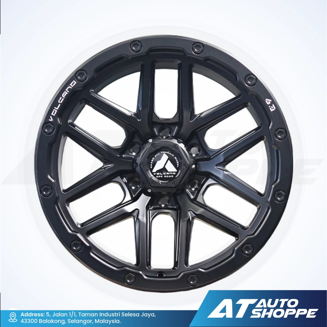 Black alloy wheel with visible branding on a white background