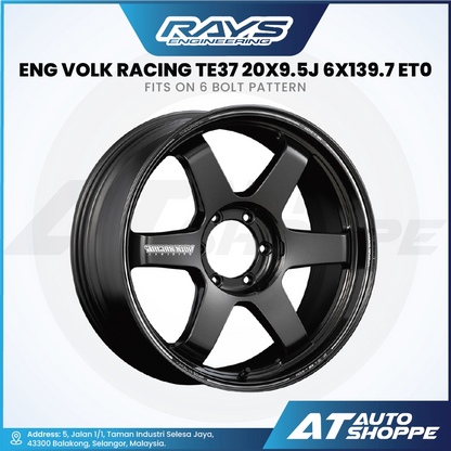 Black wheel rim with RAYS Engineering and AT Auto Shoppe branding on a white background