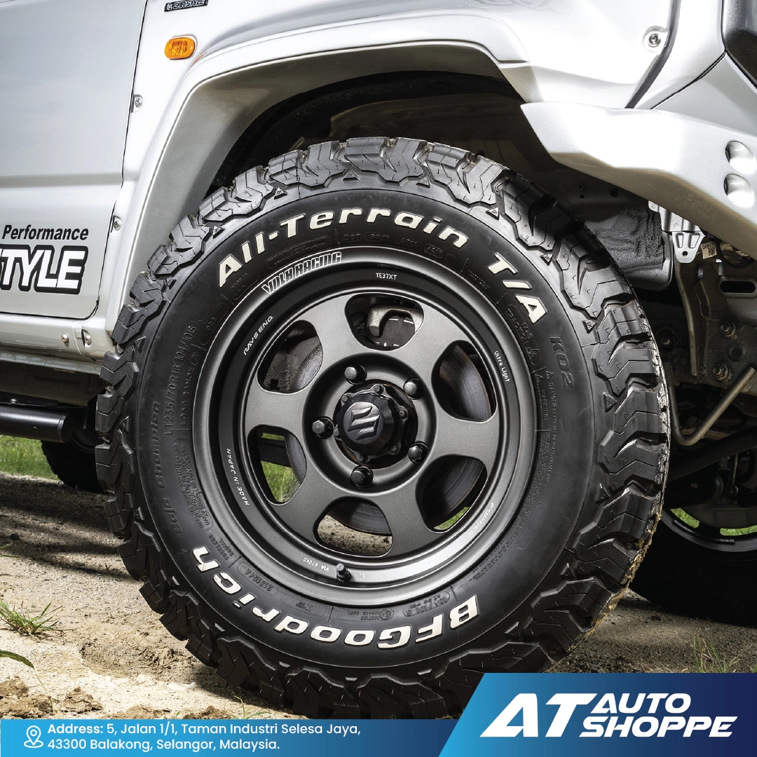 Close-up of a tire with 'All-Terrain' and 'Goodrich' branding on a vehicle.