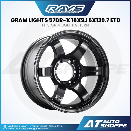 Black alloy wheel with product details on a white background