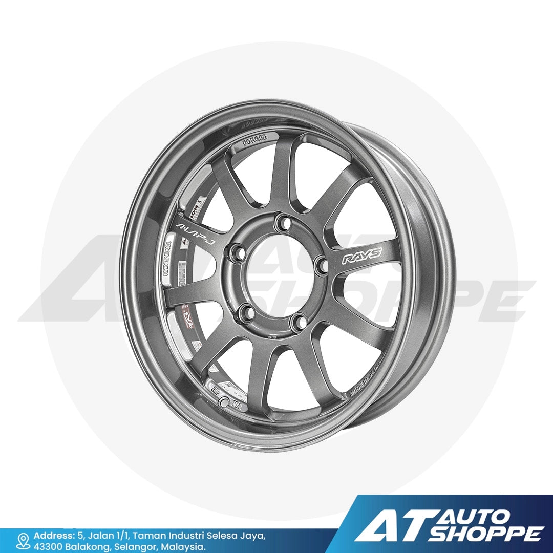 Silver alloy wheel with 'AT Auto Shoppe' branding on a white background