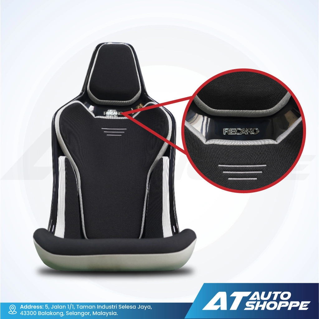 Black car seat cover with branding detail on a white background, featuring AT Auto Shoppe logo.