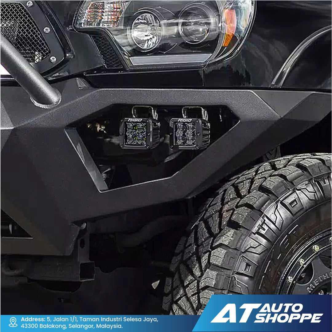 Close-up of Rigid Industries D-Series Midnight Edition Spotlight with 'AT Auto Shoppe' branding.