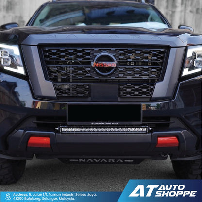 Front view of a black Nissan Navara with Rigid SR Series Pro light bar.