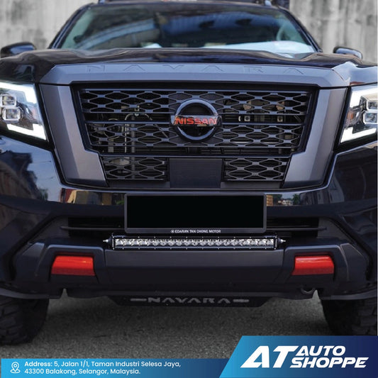 Front view of a black Nissan Navara with Rigid SR Series Pro light bar.