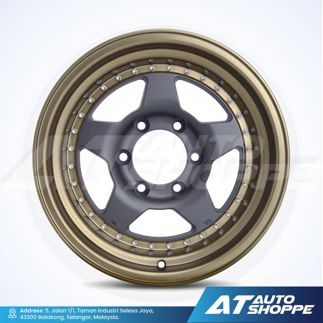Car wheel rim with gold and black finish on a white background, featuring AT Auto Shoppe branding.