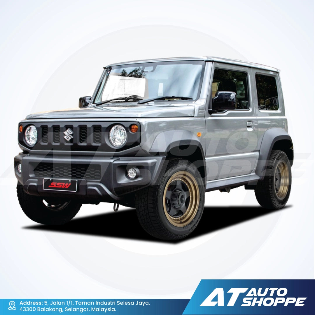 Gray SUV on a white background with AT Auto Shoppe branding.