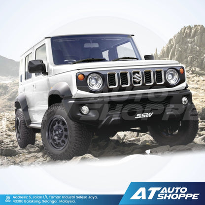 White SUV driving on a rocky terrain with 'AT Auto Shoppe' branding.