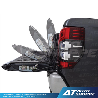 Car tail light assembly with LED components on a white background, featuring AT Auto Shoppe branding.