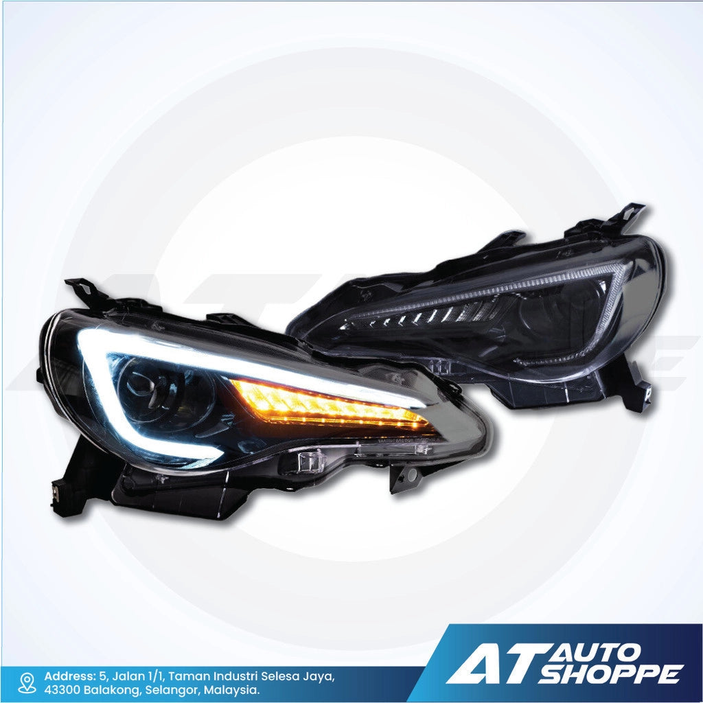 Vland headlights with visible brand logo on a white background