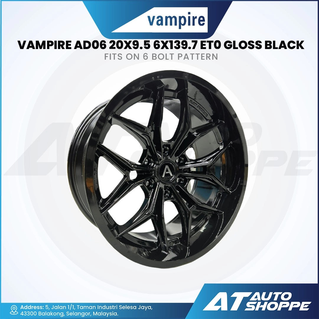 Black alloy wheel with Vampire branding on a white background