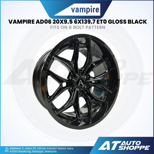 Black alloy wheel with Vampire branding on a white background